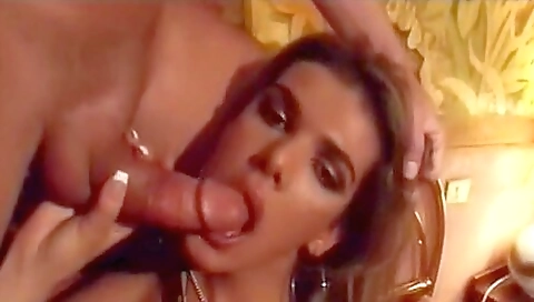 Horny brunette has sex with a big cock in a threeway