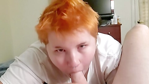 Redhead babe giving a good handjob in the amateur porn video