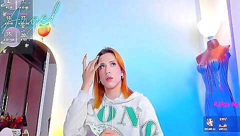 Red head with tattoos enjoys a dildo riding in camera