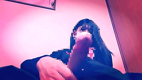 Japanese crossdresser masturbates with her erect penis