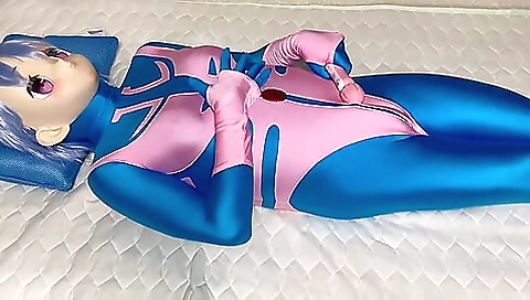 Cosplayer in pink bikini undresses to play with a toy