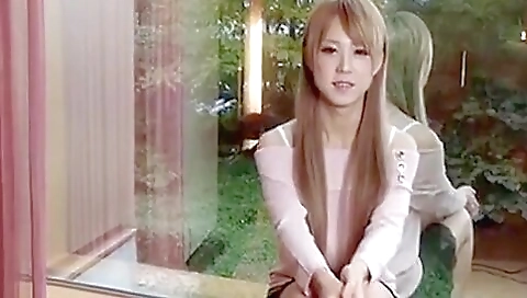 Japanese blonde strips in her bedroom to make a solo video