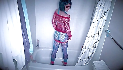 Latina girl stretches her hairy pussy in the shower