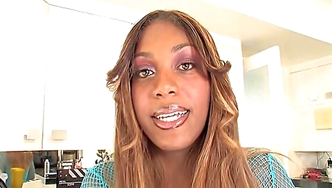 Ebony hottie wearing stockings masturbating on her bed