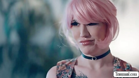 Redheaded pornstar in a tattooed body is fucked in her ass