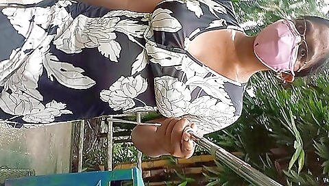 Amateur with big tits is making solo outdoor video